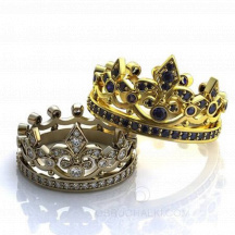 Венчальные кольца в виде короны с лилиями и драгоценными камнями  фото