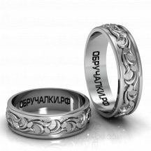 Красивые обручальные кольца с резным природным орнаментом  фото