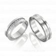 Обручальные кольца с белыми и черными бриллиантами MYSTERY WEDDING RINGS на заказ фото
