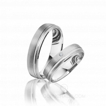 Классические обручальные кольца из белого золота с 1 бриллиантом фото