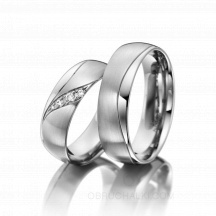 Свадебные кольца с бриллиантами и матовой отделкой поверхности  фото