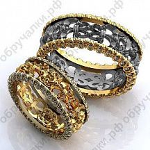 Необычные обручальные кольца с резным узором и бриллиантами  фото