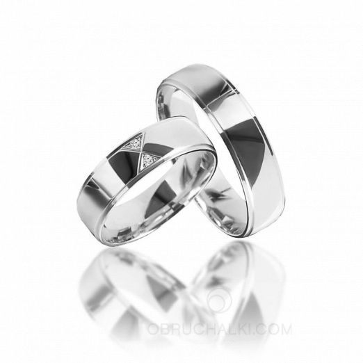 Уникальные обручальные кольца из платины на заказ фото