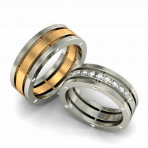 Стильные обручальные комбинированные кольца с бриллиантами и изумрудами  фото