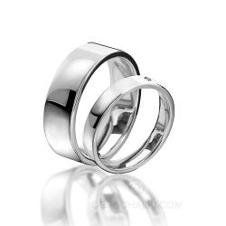 Широкие гладкие обручальные кольца в минималистичном стиле из белого золота фото
