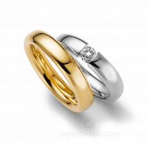 Классические гладкие обручальные кольца с бриллиантом AURORA фото