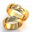 Классические обручальные кольца с орнаментом и бриллиантом  на заказ фото