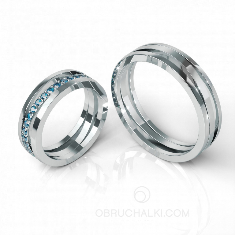 Парные обручальные кольца из белого золота с голубыми бриллиантами WAVY BLUE DIAMONDS