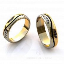 Свадебные кольца с эффектом волны с сапфирами и бриллиантами  фото