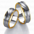 Свадебные комбинированные кольца с дизайнерской поверхностью и бриллиантом  на заказ фото