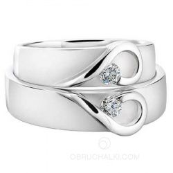 Красивые парные обручальные кольца с крупными бриллиантами  фото