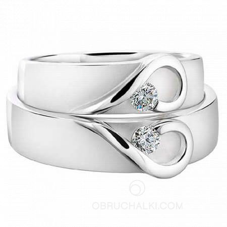 Красивые парные обручальные кольца с крупными бриллиантами  на заказ фото