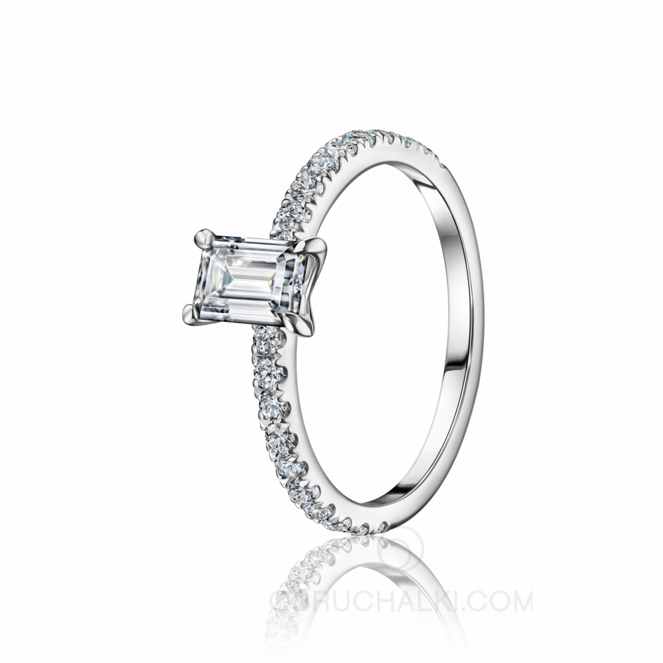 Помолвочное кольцо из белого золота с крупным бриллиантом огранки эмеральд и дорожкой бриллиантов EMERALD AVENUE